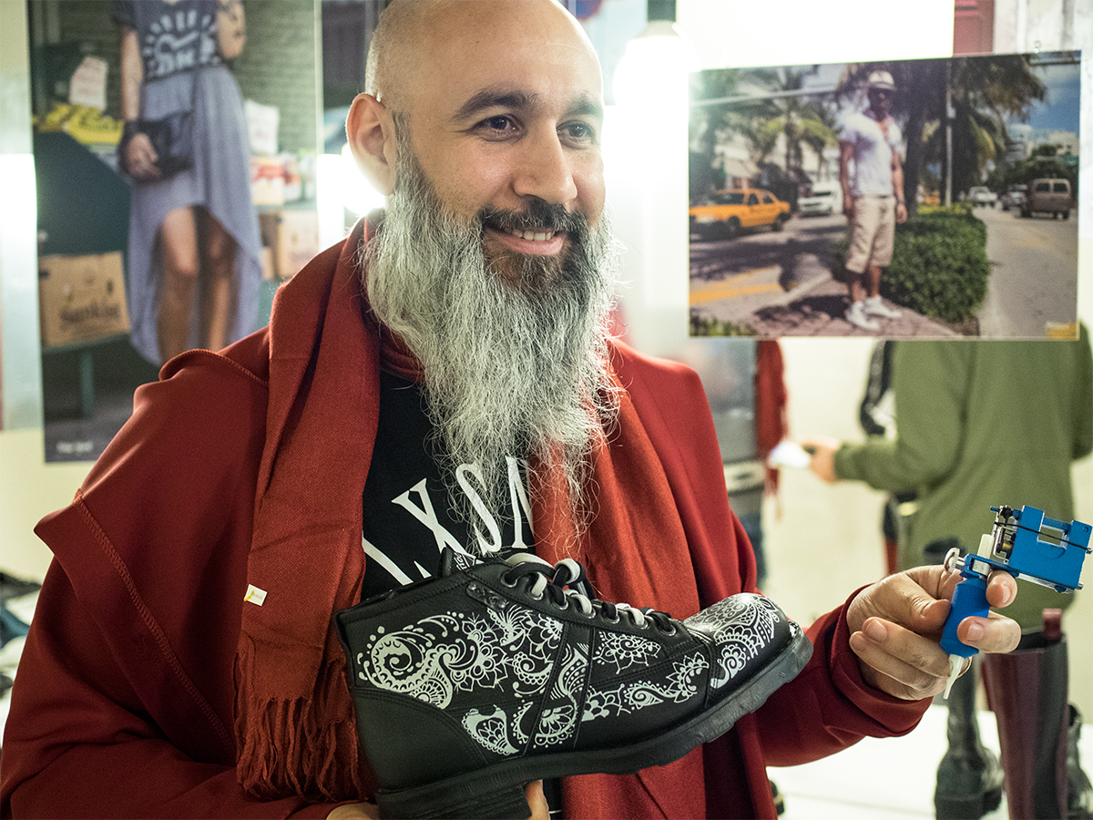 Tattoo artist Alle Tattoo designed a capsule collection for OXS with his tattoo gun. Photo by Salvo Sportato