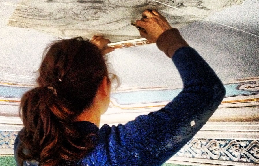 Corrada restores her family's home, once lived in by her great great grandfather, by hand.