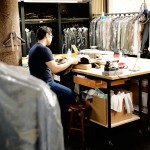 South Korean apprentice Kim works on a suit by hand. Photo by Salvo Sportato