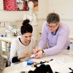 Professor Pasqualina Inserra works with a student as she sews.Photo Salvo Sportato