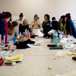 The Theater Costume students gather around professor Chiara Donato. Photo by Salvo Sportato