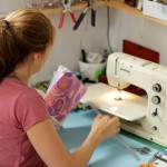 Alison-Vard-sewing-in-her-studio-Cire