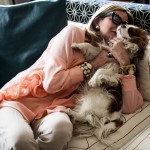 Cuddling with her puppy. Photo by Salvo Sportato