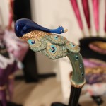 Peacock brass handle with Swarovski crystals.